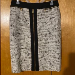 Classy Calvin Klein business skirt with gold zipper embellishments!